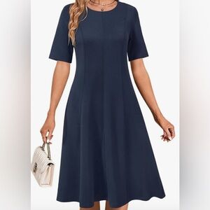 39. NWT Newshows Women’s Navy Short Sleeve Dress